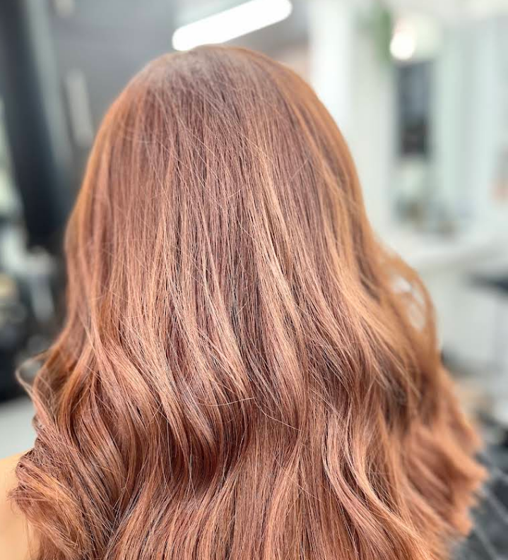 Warm copper strawberry blonde waves