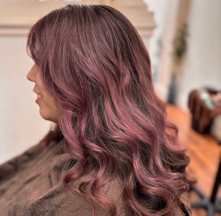 Deep burgundy waves with soft pink highlights