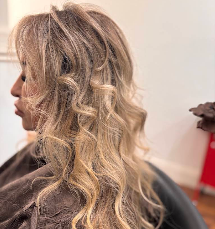 Long blonde waves with dimensional highlights